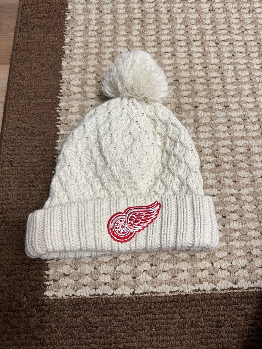 Cream Cable-Knit Pom Beanie with Red Wing Patch